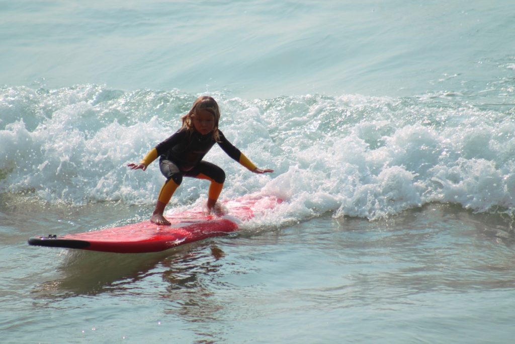 female child wakeboarding